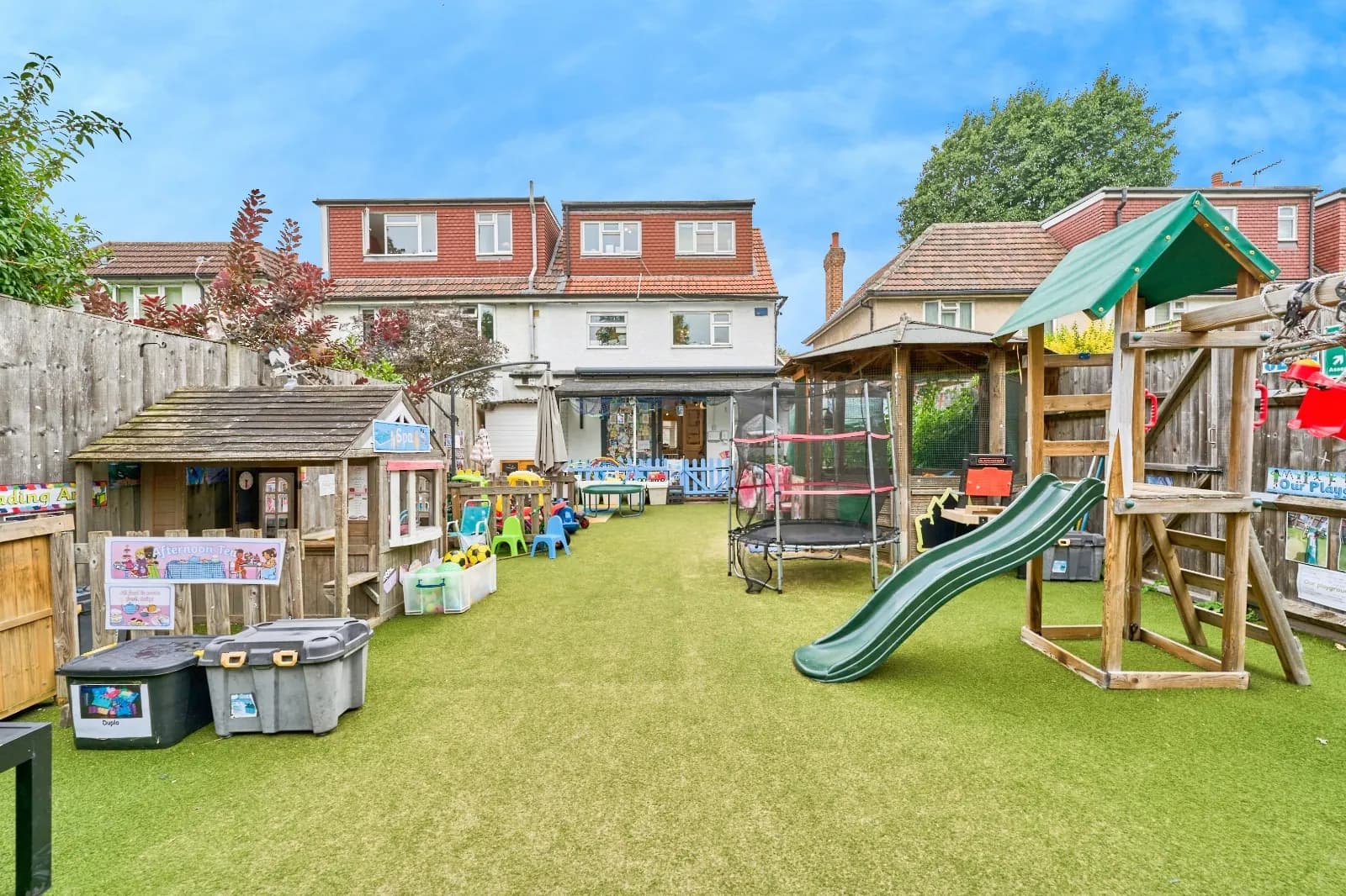 Secure rear garden and outdoor play area at Montys Nursery
