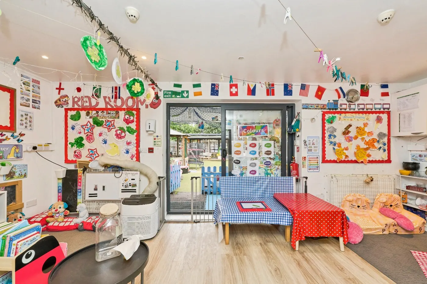 Nursery room with doors opening onto the garden